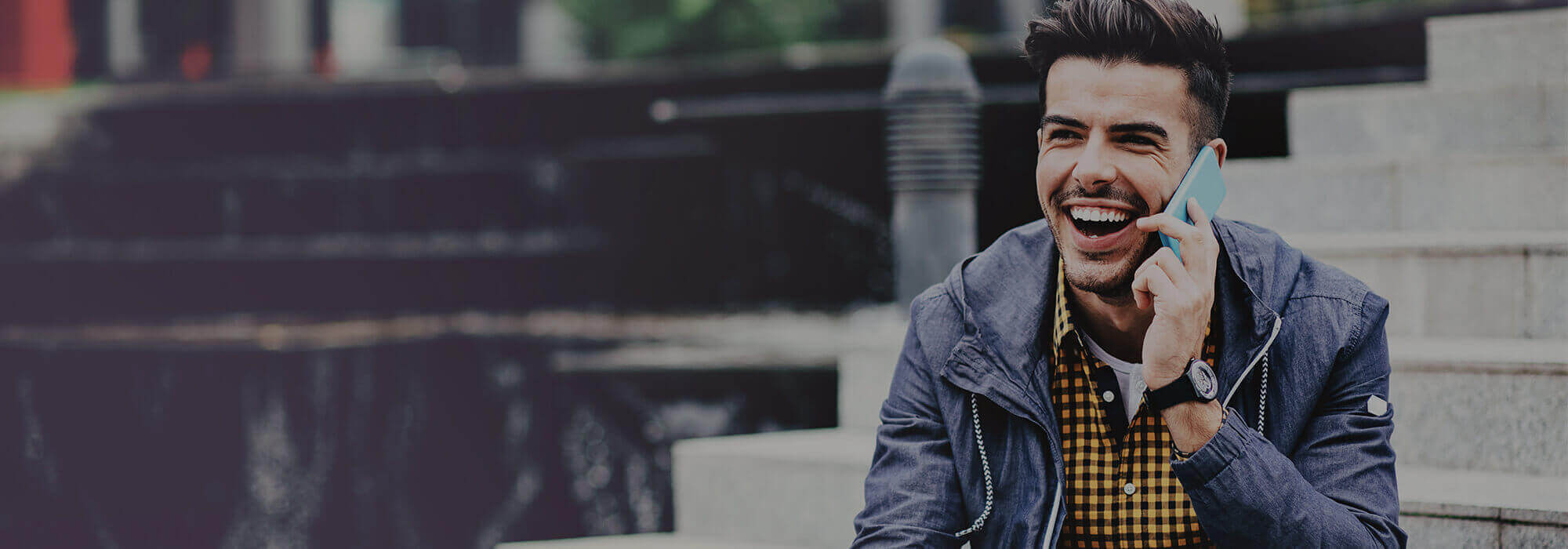 Man Smiling On Mobile